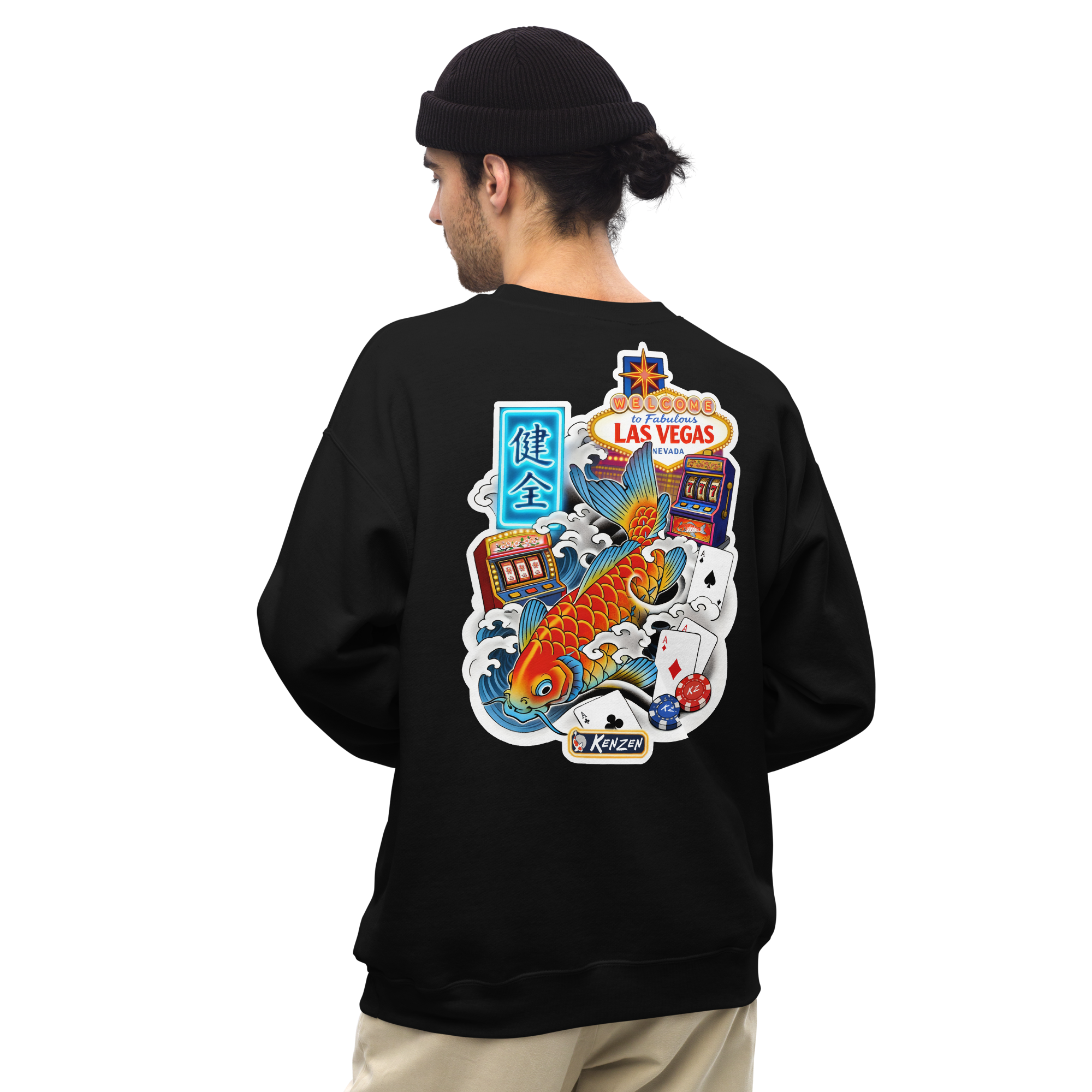 Kenzen Koi Vegas crewneck sweatshirt back view on male model wearing beanie, bold koi fish graphic with Welcome to Las Vegas sign, slot machines, playing cards, poker chips, and Japanese kanji, Keeper's Collector Edition Release 02